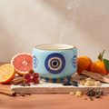 Paddywax Adopo Eye – Incense & Smoke Keramik Duftkerze mit Duftzutaten: Grapefruit, Mandarine, Zimt, Nelke, Gewürzorchidee, Tonkabohne, Weihrauch, Myrrhe und Zedernholz